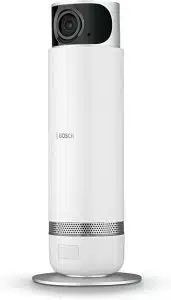 Caméra de surveillance Bosch cylindrique blanche, sur son socle