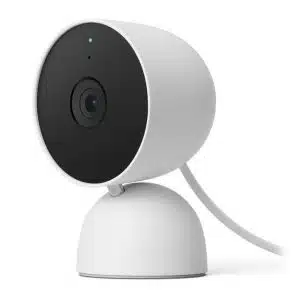 Caméra Google Nest blanche posée sur son support arrondi